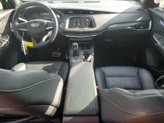 2023 Cadillac XT4 FWD Sport with VIN 1GYFZER42PF102436, listed as a Copart auction lot 84529474 with 33,679 mi miles and Salvage Title. Bid and sale history available at carsss.com. Image 8.