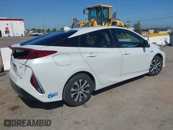 2021 Toyota Prius LE with VIN JTDKAMFP2M3177459, listed as a IAAI auction lot 42093828 with 65,501 mi miles and . Bid and sale history available at DreamBid. Image 4.