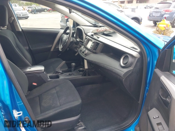 2018 Toyota RAV4 LE with VIN 2T3BFREV6JW740214, listed as a IAAI auction lot 42106349 with 105,831 mi miles and . Bid and sale history available at carsss.com. Image 5.