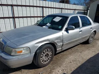 2007 Mercury Grand Marquis LS with VIN 2MEFM75V77X601170, listed as a IAAI auction lot 41517369 with 210,800 mi miles. Bid and sale history available at carsss.com. Image 6.