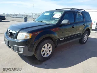 2008 Mazda Tribute Grand Touring with VIN 4F2CZ02Z28KM14136, listed as a IAAI auction lot 41878738 with 155,465 mi miles. Bid and sale history available at carsss.com. Image 2.
