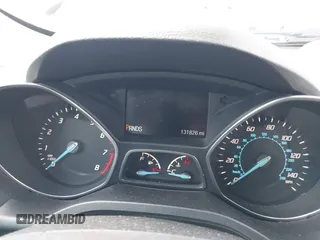 2016 Ford Escape SE z VIN 1FMCU9GX8GUA79697, wystawiony jako IAAI lot #42199779 z przebiegiem 131 826 mil mil oraz . Historia ofert i sprzedaży dostępna na DreamBid. Obrazek 7.