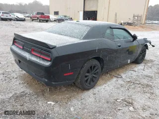 2019 Dodge Challenger SXT with VIN 2C3CDZAG0KH723481, listed as a IAAI auction lot 41631273 with 111,412 mi miles. Bid and sale history available at carsss.com. Image 4.