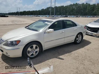 2005 Acura RL z VIN JH4KB16535C006603, wystawiony jako Copart lot #57969935 z przebiegiem 176 336 mil mil oraz Czysty tytuł • Clean title. Historia ofert i sprzedaży dostępna na DreamBid. Obrazek 1.