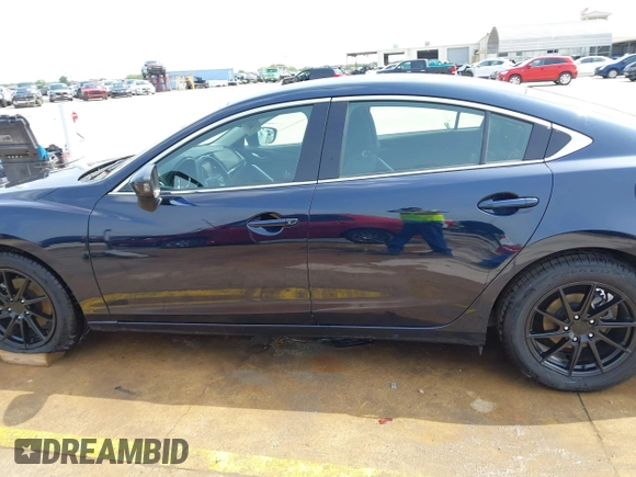 2015 Mazda 6 i Sport with VIN JM1GJ1U52F1201571, listed as a IAAI auction lot 42096344 with 88,290 mi miles and . Bid and sale history available at DreamBid. Image 14.