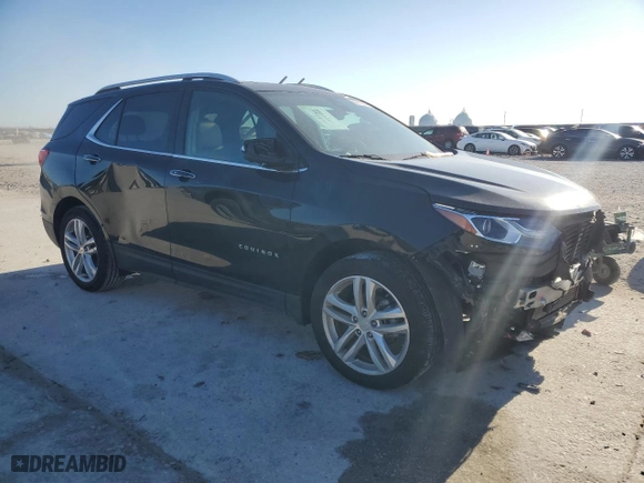 2021 Chevrolet Equinox Premier with VIN 2GNAXNEV7M6130413, listed as a Copart auction lot 86219664 with 96,631 mi miles and Salvage Title. Bid and sale history available at carsss.com. Image 4.