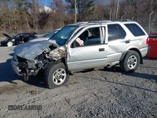 2001 Isuzu Rodeo S with VIN 4S2DM58W414351245, listed as a IAAI auction lot 41339632 with 149,543 mi miles and . Bid and sale history available at DreamBid. Image 2.