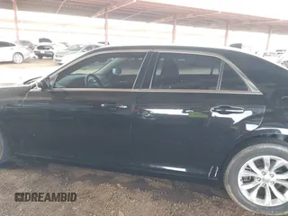 2016 Chrysler 300 Anniversary Edition with VIN 2C3CCAAG4GH141217, listed as a IAAI auction lot 42121809 with 74,739 mi miles and . Bid and sale history available at DreamBid. Image 15.