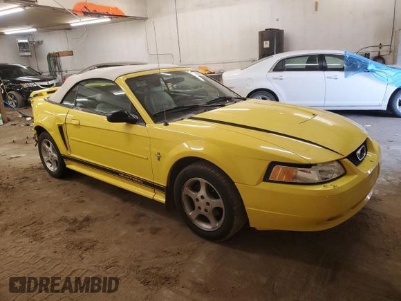 2003 Ford Mustang Deluxe with VIN 1FAFP44473F398549, listed as a Copart auction lot 56190165 with 135,386 mi miles and Salvage title. Bid and sale history available at DreamBid. Image 4.