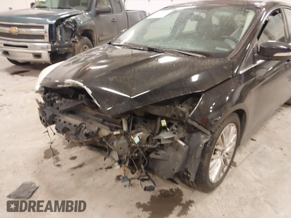2017 Ford Focus Titanium with VIN 1FADP3N25HL222297, listed as a IAAI auction lot 41698707 with 121,756 mi miles and . Bid and sale history available at carsss.com. Image 6.