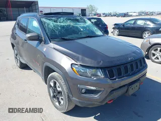 2019 Jeep Compass Trailhawk with VIN 3C4NJDDB0KT619337, listed as a IAAI auction lot 42171160 with 63,869 mi miles and . Bid and sale history available at DreamBid. Image 6.