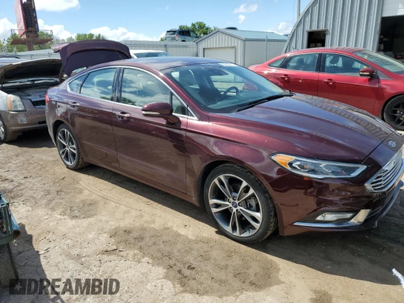 2017 Ford Fusion Titanium with VIN 3FA6P0D95HR208813, listed as a Copart auction lot 60832915 with 62,920 mi miles and Salvage title. Bid and sale history available at DreamBid. Image 4.