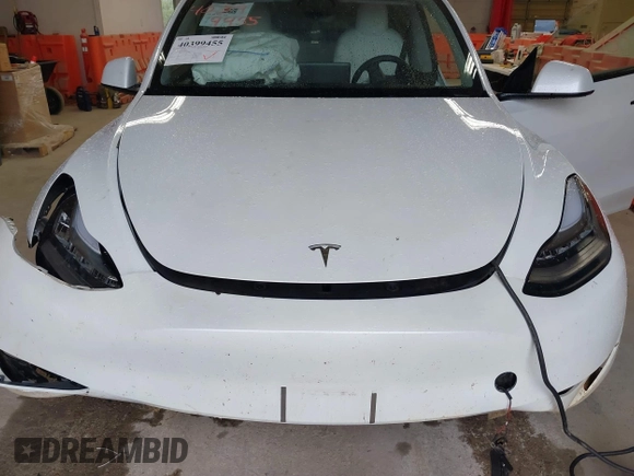 2023 Tesla Model Y Long Range with VIN 7SAYGDEE7PA100523, listed as a IAAI auction lot 40399455 with 18,885 mi miles and . Bid and sale history available at DreamBid. Image 10.