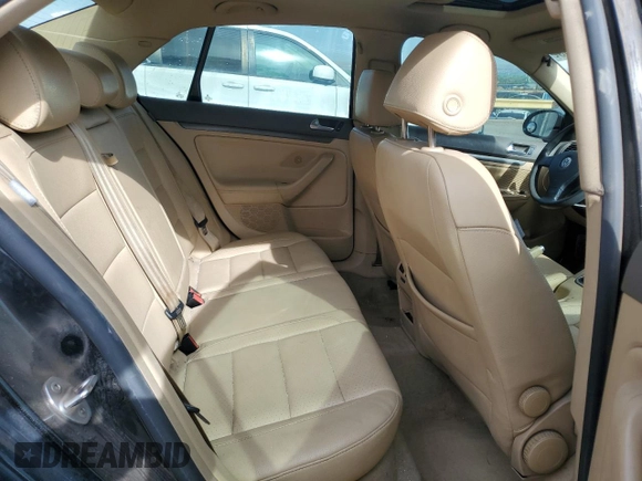 2006 Volkswagen Jetta 1.9L TDI z VIN 3VWST81KX6M746490, wystawiony jako Copart lot #58409565 z przebiegiem 229 433 mil mil oraz Szkoda całkowita • Salvage title. Historia ofert i sprzedaży dostępna na DreamBid. Obrazek 10.
