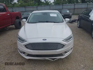 2017 Ford Fusion Titanium with VIN 3FA6P0D96HR239830, listed as a IAAI auction lot 42741998 with 116,951 mi miles and . Bid and sale history available at DreamBid. Image 13.