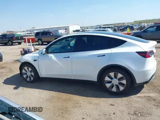 2021 Tesla Model Y Long Range with VIN 5YJYGDEE4MF122362, listed as a IAAI auction lot 42096138 with 47,006 mi miles and . Bid and sale history available at DreamBid. Image 15.