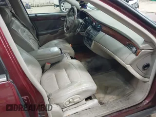 2002 Cadillac DeVille with VIN 1G6KD54Y12U214732, listed as a IAAI auction lot 42018412 with 139,474 mi miles. Bid and sale history available at carsss.com. Image 5.