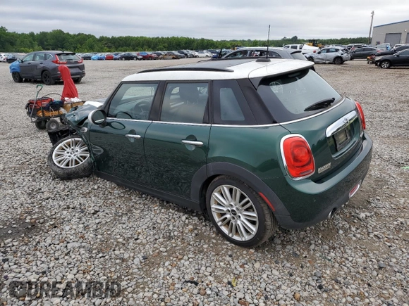 2018 MINI Hardtop 4 Door Cooper with VIN WMWXU1C56J2F79128, listed as a Copart auction lot 60848735 with 35,392 mi miles and Salvage title. Bid and sale history available at DreamBid. Image 2.
