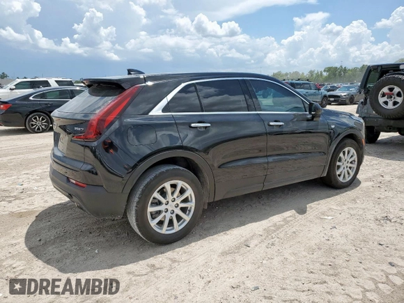 2023 Cadillac XT4 FWD Luxury with VIN 1GYAZAR46PF178003, listed as a Copart auction lot 59121545 with 42,000 mi miles and Salvage title. Bid and sale history available at DreamBid. Image 3.
