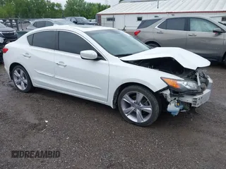 2014 Acura ILX with VIN 19VDE1F38EE008591, listed as a IAAI auction lot 42312123 with 119,671 mi miles and . Bid and sale history available at DreamBid. Image 1.