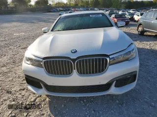 2019 BMW 7 Series 740i с VIN WBA7E2C51KB218262, выставлен на аукционе Copart как лот 52755095 с пробегом 55 082 миль миль и Списание • Salvage title. История ставок и продаж доступна на DreamBid. Изображение 5.