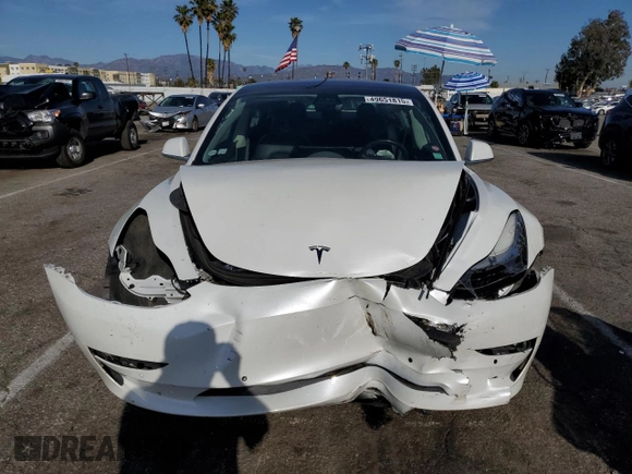 2019 Tesla Model 3 Mid Range z VIN 5YJ3E1EA7KF300175, wystawiony jako Copart lot #49651815 z przebiegiem Nie podano mil oraz Szkoda całkowita • Salvage title. Historia ofert i sprzedaży dostępna na DreamBid. Obrazek 5.