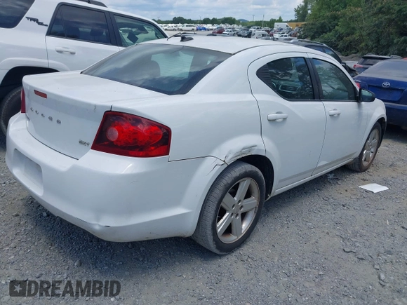 2013 Dodge Avenger SXT with VIN 1C3CDZCB1DN708483, listed as a IAAI auction lot 42702833 with 185,681 mi miles and . Bid and sale history available at DreamBid. Image 4.