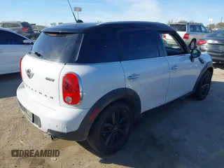 2014 MINI Countryman with VIN WMWZB3C59EWR40065, listed as a IAAI auction lot 40838816 with 80,000 mi miles and . Bid and sale history available at DreamBid. Image 4.