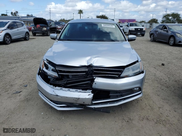 2015 Volkswagen Jetta Sedan 1.8T SE with VIN 3VWD17AJXFM210137, listed as a Copart auction lot 50099535 with 53,329 mi miles and Salvage Title. Bid and sale history available at carsss.com. Image 5.