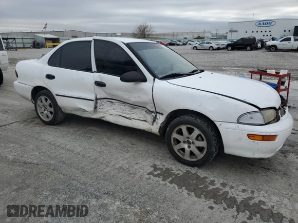 1996 Geo Prizm z VIN 1Y1SK5263TZ061291, wystawiony jako Copart lot #85366554 z przebiegiem 211 051 mil mil oraz Szkody całkowita. Historia ofert i sprzedaży dostępna na DreamBid. Obrazek 4.