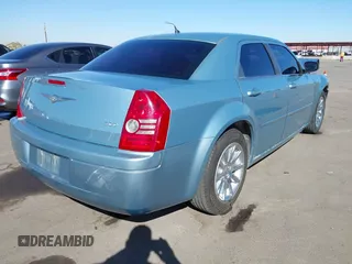 2008 Chrysler 300 LX with VIN 2C3KA43R08H267996, listed as a IAAI auction lot 41651603 with 188,760 mi miles. Bid and sale history available at carsss.com. Image 4.