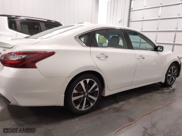 2017 Nissan Altima 2.5 SR with VIN 1N4AL3AP5HC265540, listed as a IAAI auction lot 41284731 with 125,504 mi miles. Bid and sale history available at carsss.com. Image 13.