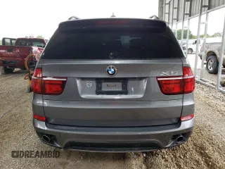 2012 BMW X5 35d with VIN 5UXZW0C53CL671564, listed as a Copart auction lot 60880715 with 154,401 mi miles and Clean title. Bid and sale history available at DreamBid. Image 6.