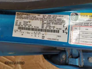 2013 Ford Fiesta SE z VIN 3FADP4EJ7DM216071, wystawiony jako Copart lot #58629155 z przebiegiem 73 407 mil mil oraz Szkoda całkowita • Salvage title. Historia ofert i sprzedaży dostępna na DreamBid. Obrazek 13.