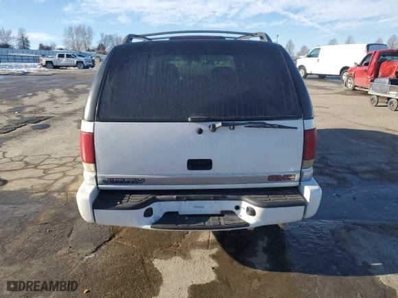 2000 GMC Envoy with VIN 1GKDT13W4Y2348984, listed as a Copart auction lot 89062865 with 159,592 mi miles and Salvage Title. Bid and sale history available at carsss.com. Image 6.