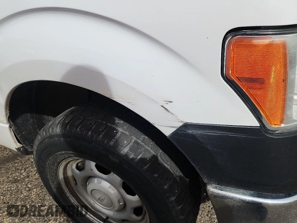 2014 Ford F-150 XL with VIN 1FTFX1EF1EKG55840, listed as a IAAI auction lot 42246556 with 471,369 mi miles and . Bid and sale history available at carsss.com. Image 1.