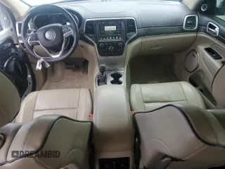 2017 Jeep Grand Cherokee Overland with VIN 1C4RJFCT7HC734125, listed as a Copart auction lot 54333215 with 101,229 mi miles and Salvage title. Bid and sale history available at DreamBid. Image 8.