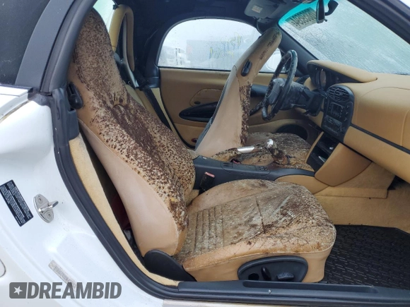 1998 Porsche Boxster с VIN WP0CA2987WU623387, выставлен на аукционе Copart как лот 76859594 с пробегом Не указан миль и Списание • Salvage title. История ставок и продаж доступна на DreamBid. Изображение 10.