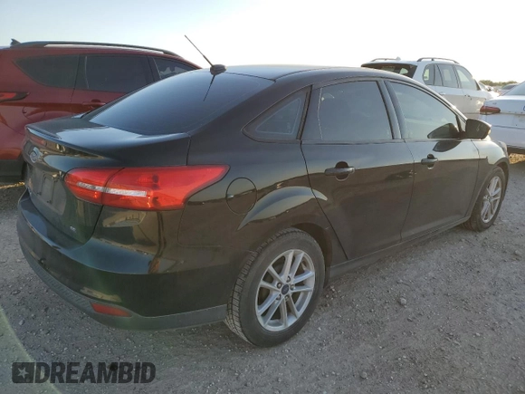 2017 Ford Focus SE with VIN 1FADP3F25HL219608, listed as a Copart auction lot 56559925 with 100,207 mi miles and Salvage title. Bid and sale history available at DreamBid. Image 3.