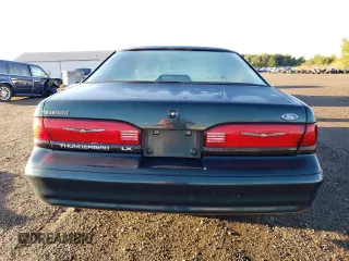 1995 Ford Thunderbird LX z VIN 1FALP6248SH176946, wystawiony jako Copart lot #74066554 z przebiegiem 72 666 mil mil oraz Szkoda całkowita • Salvage title. Historia ofert i sprzedaży dostępna na DreamBid. Obrazek 6.