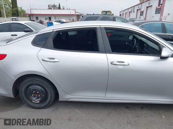 2016 Kia Optima LX with VIN 5XXGT4L34GG023812, listed as a IAAI auction lot 42034160 with 96,720 mi miles and . Bid and sale history available at DreamBid. Image 6.