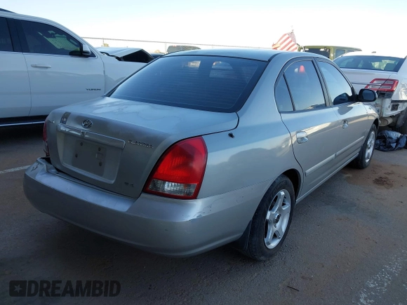 2003 Hyundai Elantra GLS z VIN KMHDN45D43U552485, wystawiony jako IAAI lot #41680449 z przebiegiem 127 899 mil mil oraz . Historia ofert i sprzedaży dostępna na DreamBid. Obrazek 4.