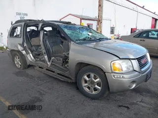 2003 GMC Envoy SLT z VIN 1GKET16S136227151, wystawiony jako IAAI lot #41525983 z przebiegiem Nie podano mil oraz . Historia ofert i sprzedaży dostępna na DreamBid. Obrazek 1.