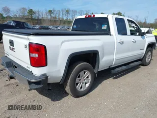 2017 GMC Sierra 1500 SLE z VIN 1GTV2MEC0HZ291794, wystawiony jako IAAI lot #42055172 z przebiegiem 235 969 mil mil oraz . Historia ofert i sprzedaży dostępna na DreamBid. Obrazek 4.