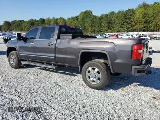 2015 GMC Sierra 3500HD Denali z VIN 1GT424E86FF533171, wystawiony jako Copart lot #74837874 z przebiegiem 128 234 mil mil oraz Szkoda całkowita • Salvage title. Historia ofert i sprzedaży dostępna na DreamBid. Obrazek 2.