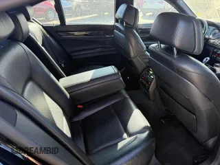 2013 BMW 7 Series 750i with VIN WBAYA8C5XDC996785, listed as a Copart auction lot 48892145 with 134,427 mi miles and Clean Title. Bid and sale history available at DreamBid. Image 6.