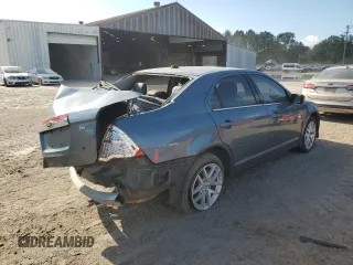 2012 Ford Fusion SEL z VIN 3FAHP0JA9CR333944, wystawiony jako Copart lot #56907605 z przebiegiem 180 386 mil mil oraz Szkoda całkowita • Salvage title. Historia ofert i sprzedaży dostępna na DreamBid. Obrazek 3.