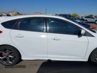 2014 Ford Focus ST with VIN 1FADP3L92EL341579, listed as a IAAI auction lot 42106528 with 104,150 mi miles and . Bid and sale history available at carsss.com. Image 13.