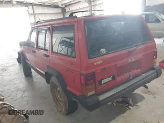 1996 Jeep Cherokee Sport with VIN 1J4FJ68S0TL177046, listed as a IAAI auction lot 42412615 with 176,657 mi miles and . Bid and sale history available at DreamBid. Image 3.