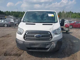 2015 Ford Transit Cargo z VIN 1FTNR1ZM5FKA65799, wystawiony jako IAAI lot #42473586 z przebiegiem 99 756 mil mil oraz . Historia ofert i sprzedaży dostępna na DreamBid. Obrazek 12.